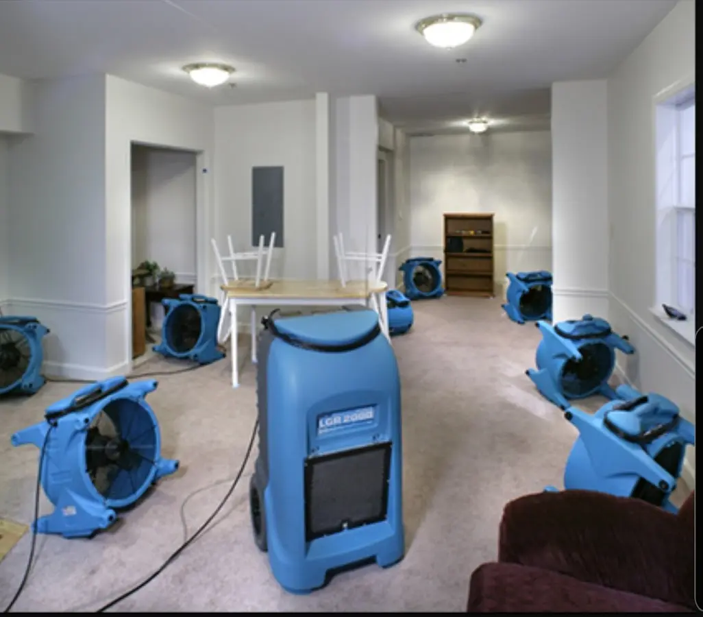 Air movers and dehumidifier setup for Water Damage Restoration in Platteville